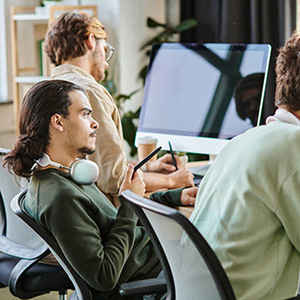 people looking at computer screens